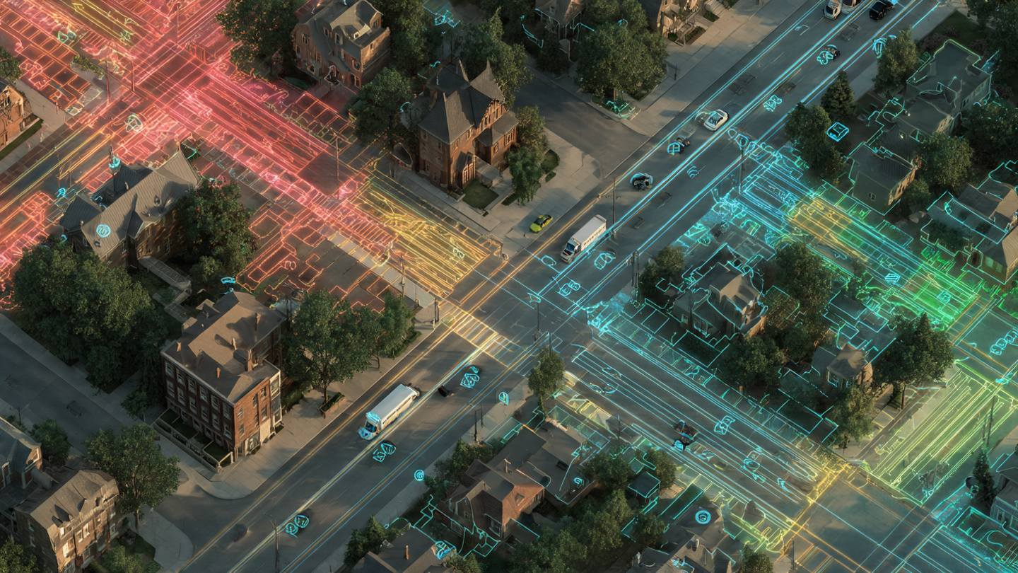 Aerial view of city streets with fleet vehicles showing temperature sensor readings and urban heat map overlay